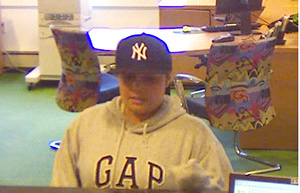 Police are trying to identify this woman seen on videotape robbing the TD Bank on Maine Mall Road.