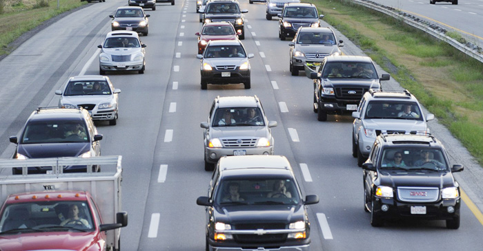 This August 2010 file photo shows traffic on the Maine Turnpike. Researchers say Fourth of July traffic in Maine will be reduced by half this year because it falls on a Wednesday.