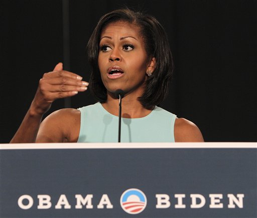 First lady Michelle Obama speaks to supporters during a campaign rally, Tuesday, July 24, 2012, in Westerville, Ohio. The first lady thanked volunteers for their hard work and spoke about what's at stake for Ohioans in this election. (AP Photo/Jay LaPrete)