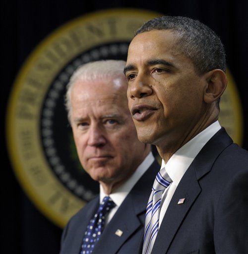 ADVANCE FOR SUNDAY, AUG. 19 AND THEREAFTER - FILE - In this Feb. 21, 2012, file photo, President Barack Obama, accompanied by Vice President Joe Biden, speaks in the Eisenhower Executive Office Building on the White House complex in Washington, on the importance of the agreement passed by Congress to extend the payroll tax cut and unemployment insurance. In May, after Joe Biden tripped up his boss by voicing support for same-sex marriage while the president remained on the fence, there was speculation about whether the remarks were spontaneous or deliberate. But to those who know Biden, there was no doubt. He was just speaking his mind. (AP Photo/Susan Walsh, File)