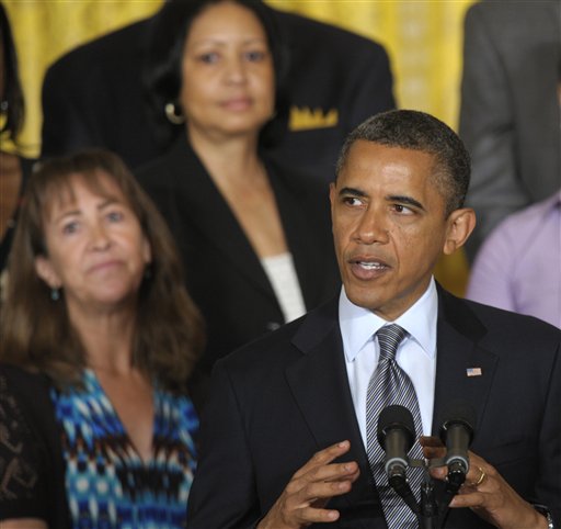 President Barack Obama calls on Congress to pass a temporary, one-year extension of the Bush-era tax cuts for people who make less than $250,000 a year, during a statement in the East Room of the White House in Washington on Monday. The Associated Press photo