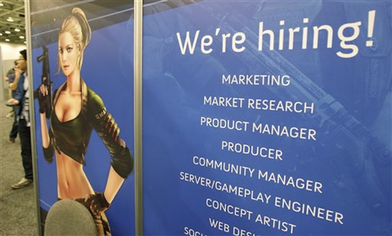 In this photo, Tencent America job booth is shown at the Game Developers Conference in San Francisco. Unemployment fell from 7.5 percent to 7.2 percent in Maine in June. (AP Photo/Paul Sakuma)