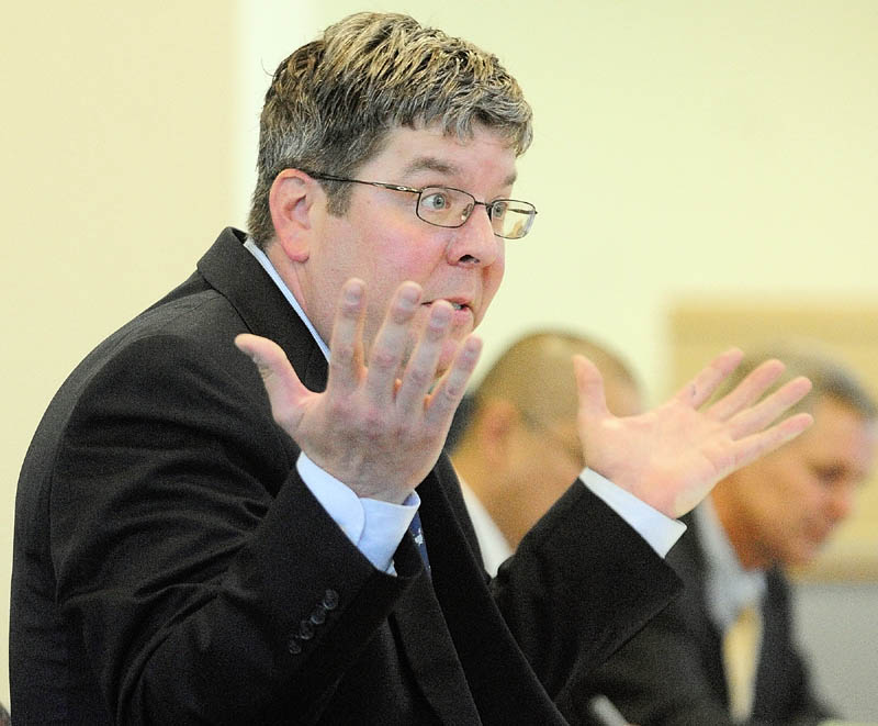 Brett Witham, of Verrill Dana, speaks for the appellant Summit Natural Gas during a hearing on Tuesday morning in the Cross State Office Building.