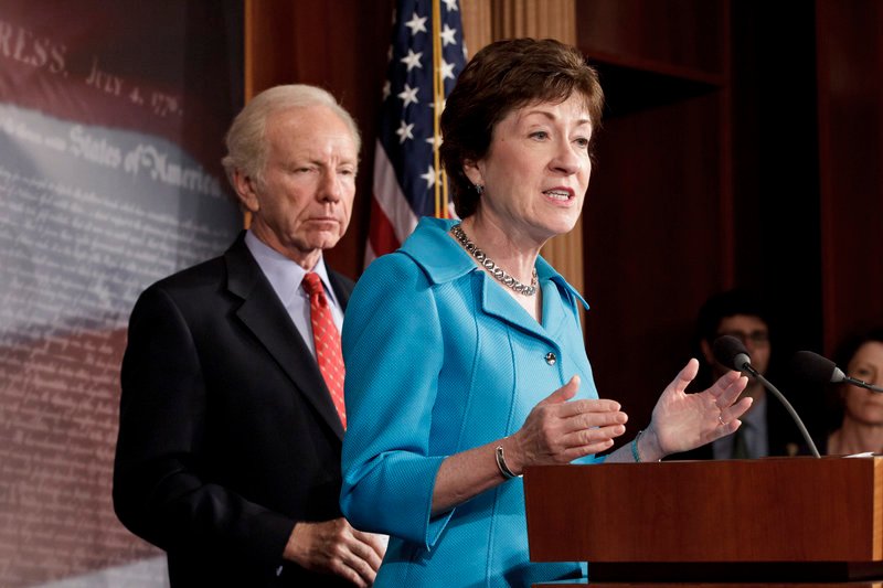 Sen. Susan Collins, R-Maine, the ranking member of the Senate Homeland Security Committee, right, accompanied by the committee's Chairman Sen. Joseph Lieberman, I-Conn., gestures during a news conference on Capitol Hill in Washington, Tuesday, July 24, 2012, to announce that the Senate will take up legislation later this week to protect critical U.S. industries and other corporate networks from cyberattacks and electronic espionage. (AP Photo/J. Scott Applewhite)