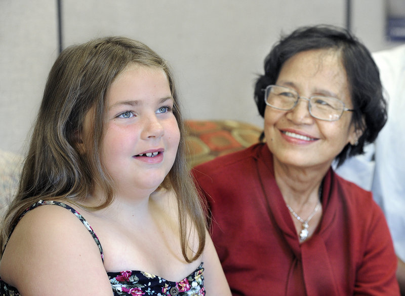 Abbie Jacobson, 8, of Scarborough, found more than $4,000 that belonged to Ra Rim, a immigrant from Cambodia, who lost the money while shopping. Abbie’s first response was to find the owner of the money. Abbie Jacobson, 8, of Scarborough, found more than $4,000 that belonged to Ra Rim, a immigrant from Cambodia, who lost the money while shopping. Abbie’s first response was to find the owner of the money.
