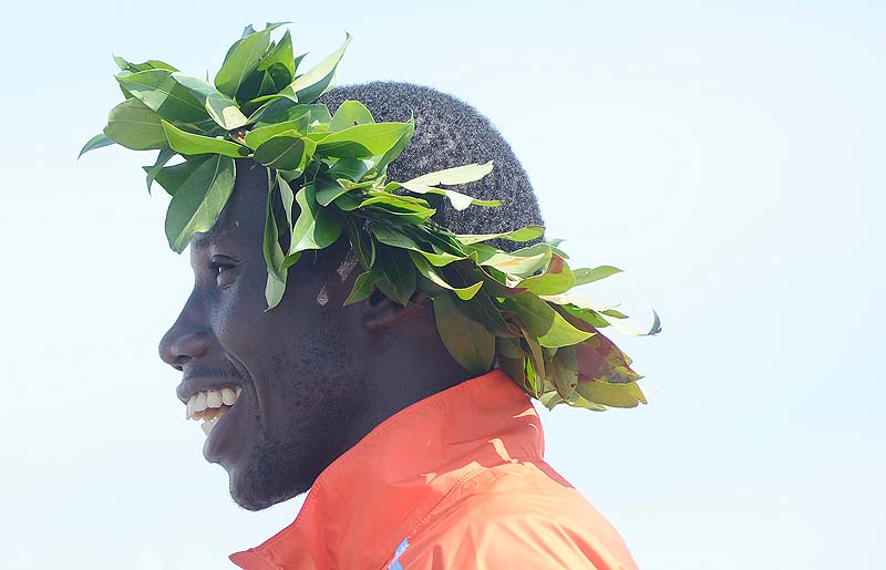 Stanley Biwott of Kenya is recognized at the awards ceremony after winning Saturday's 2012 TD Beach to Beacon 10k in Cape Elizabeth.