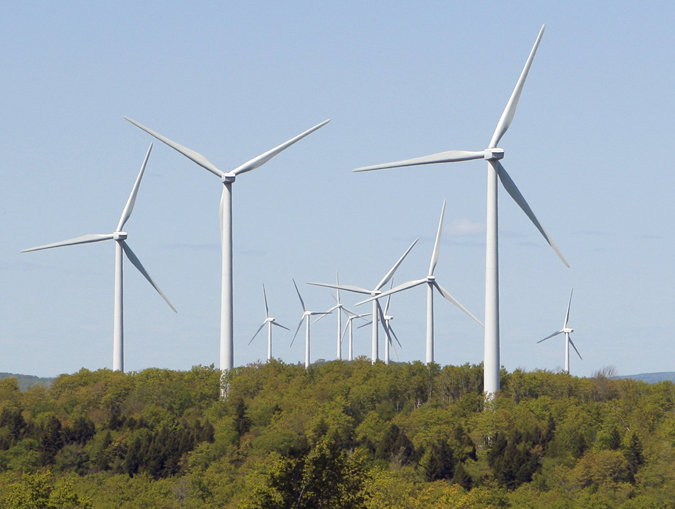 Wind turbines tower over the landscape at the Steston wind farm in Danforth. The wind farm's 55 turbines are 262 feet tall with a blade diameter of 253 feet. Technical advances now allow blade diameters of more than 300 feet, which can boost a turbine's output capacity from around 2 megawatts to 2.5 megawatts.