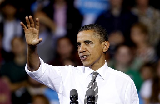 President Barack Obama speaks at a campaign event at The Memorial Athletic and Convocation Center at Kent State University Wednesday, Sept. 26, 2012, in Kent, Ohio. (AP Photo/Tony Dejak)