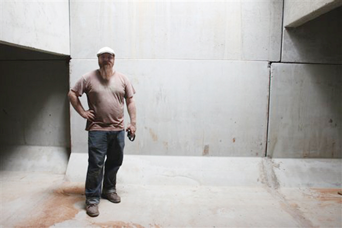 Cory Holliday, of the Tennessee chapter of The Nature Conservancy, stands in the newly completed artificial bat cave in Woodlawn, Tenn. on Tuesday.