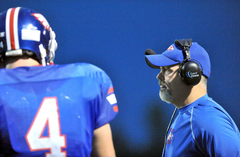 Staff photo by Michael G. Seamans Messalonskee High School head football coach, Wes Littlefield on the sidelines against Cony High School at Messalonskee High School in Oakland.