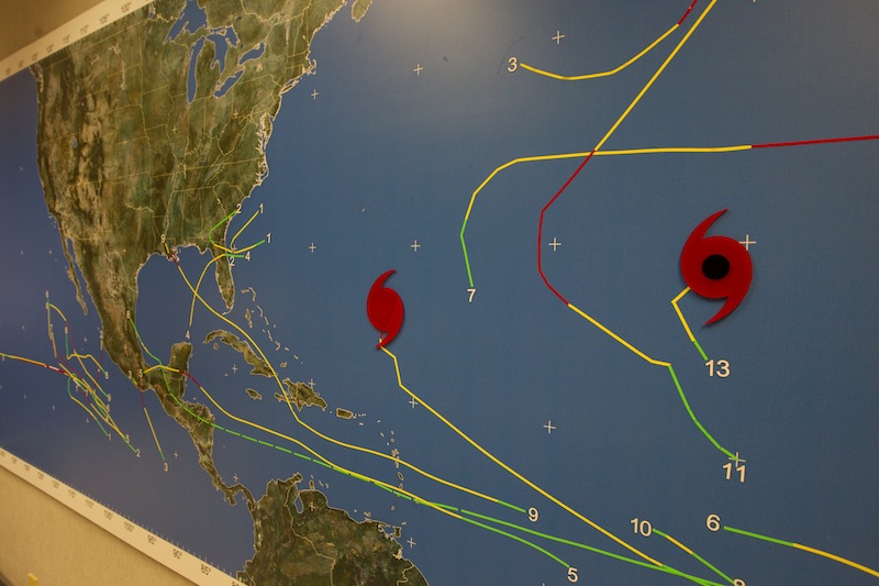 A map at the National Hurricane Center in Miami shows the location of tropical weather systems Thursday, Sept. 6, 2012. Hurricane Leslie is south of Bermuda. Tropical Storm Michael is brewing in the mid Atlantic ocean. In the Caribbean Sea, the monsoon trough is producing showers and thunderstorms over Colombia, Venezuela and the southwestern Caribbean Sea. Farther north, an area of low pressure off the coast of Alabama and western Florida Panhandle is producing showers and thunderstorms. This system has a low chance of development into a tropical cyclone. (AP Photo/J Pat Carter)