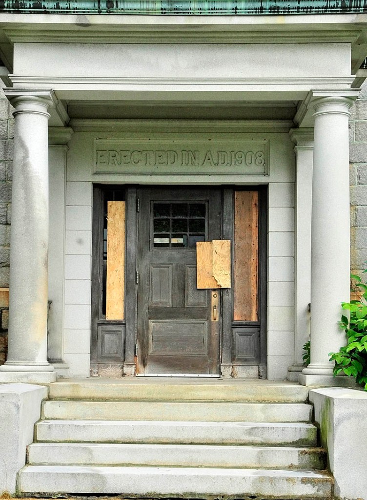 The Old Max building was built in 1908 and has many boarded up or broken windows.