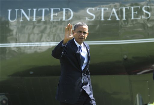 President Barack Obama walks off of Marine One at the White House in Washington, Friday, Sept. 21, 2012, after campaigning in Virginia. (AP Photo/Susan Walsh)