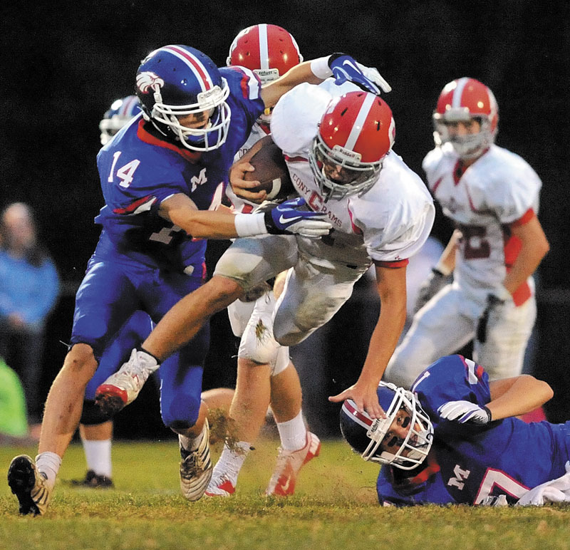 ON A ROLL: Chandler Shostak, center, and the Cony High School football team has won two straight games heading into tonight’s Pine Tree Conference Class A game against Bangor in Augusta.