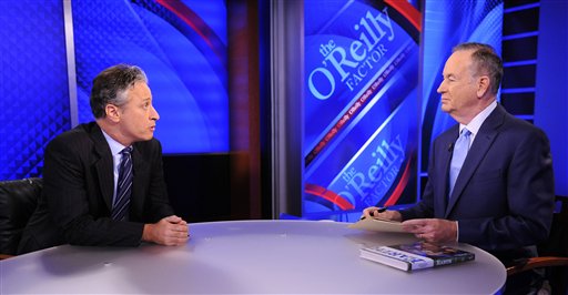 FILE - This Sept. 22, 2010 file photo shows Comedy Central's Jon Stewart from "The Daily Show with Jon Stewart," left, and and political pundit Bill O'Reilly during an interview for "The O'Reilly Factor" on FOX News Channel, in New York. O'Reilly and Jon Stewart face off for a special 90-minute debate about the 2012 presidential race. The live debate will be streamed online on Oct. 6, 2012 from George Washington University in Washington, D.C. The price is $4.95, with one-half of the profits donated to a number of unspecified charities. (AP Photo/Peter Kramer, file)