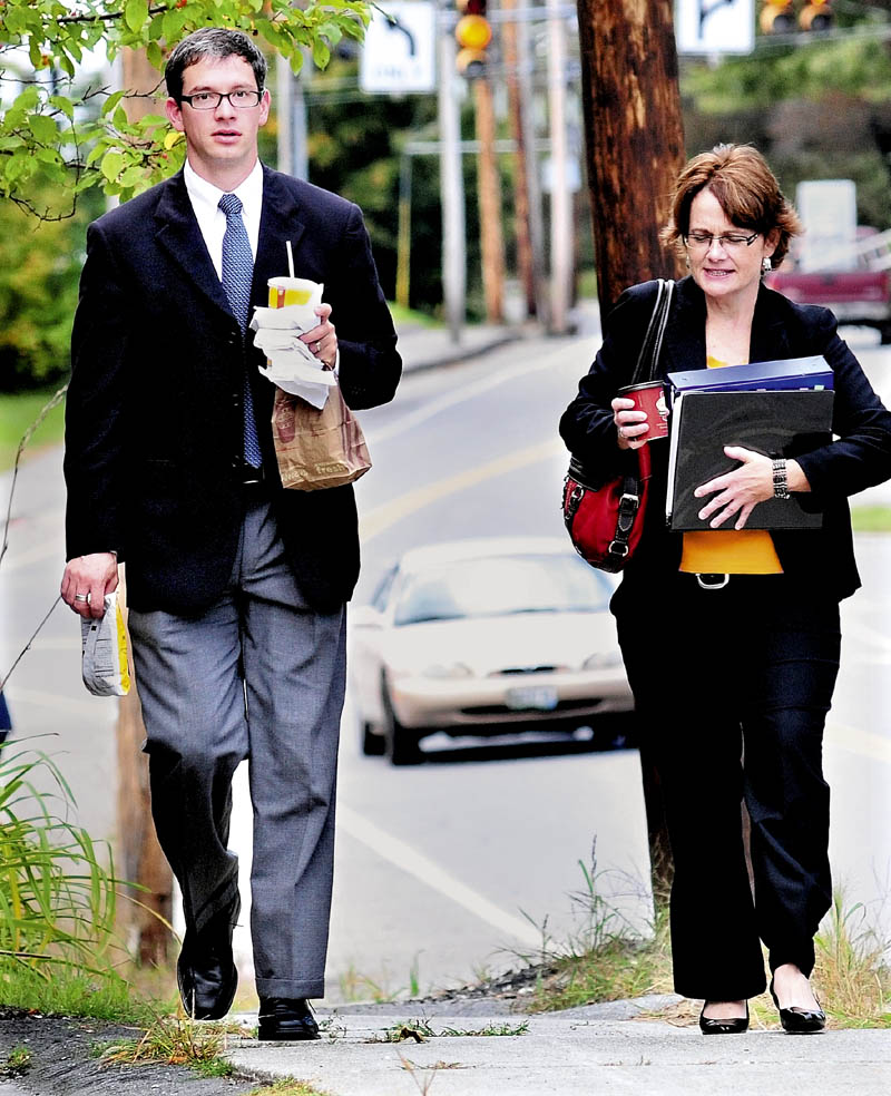 Steven Chardo and Cathy MacMillan, forensic chemists with the Maine State Crime lab, return to the Somerset County Superior Court in Skowhegan where Chardo testified earlier in the Jay Mercier murder trial on Monday.