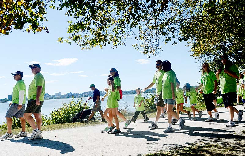 Walkers make their way around Back Cove during the Juvenile Diabetes Research Foundation International's walk to cure diabetes at Payson Park in Portland on Sunday.
