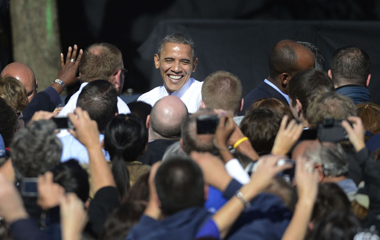 President Barack Obama shakes hands as he leaves Veteran's Memorial Park in Manchester New Hampshire on Thursday, October 17, 2012