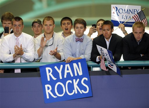 FILE - In this Monday, Sept. 3, 2012 file photo, supporters cheer for Republican vice presidential candidate, Rep. Paul Ryan, R-Wis., while he speaks at East Carolina University in Greenville, N.C. In 2008, Republican pollster Kristen Soltis says she watched disappointedly as her party "really let the youth vote go." "This election is such a huge opportunity for Republicans," says Soltis, who, at age 28, is also a member of the millennial generation. But it remains to be seen whether Republicans can win over these young voters on social issues, especially when the economy rebounds. "Either the party will have to persuade more young people _ or the party will adapt. I don't necessarily know which way that's going to go yet," Soltis says. (AP Photo/Sara D. Davis)