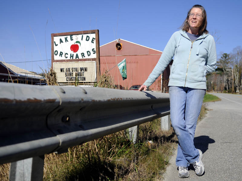 Lakeside Orchards retail manager Paula McDougal removed signs around the store and orchard along Route 17 in Manchester posted by political candidates. "We have to be apolitcal in this store," McDougal said. "We welcome everybody." The Maine Department of Transportation said it is illegal to remove political signs from the right-of-way.
