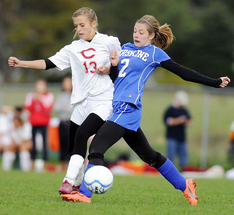 CHASE IS ON: Cony High School’s Annie Brannigan, left, attempts to drive the ball away from Erskine Academy’s Taylor Boucher during a game Tuesday in Augusta.