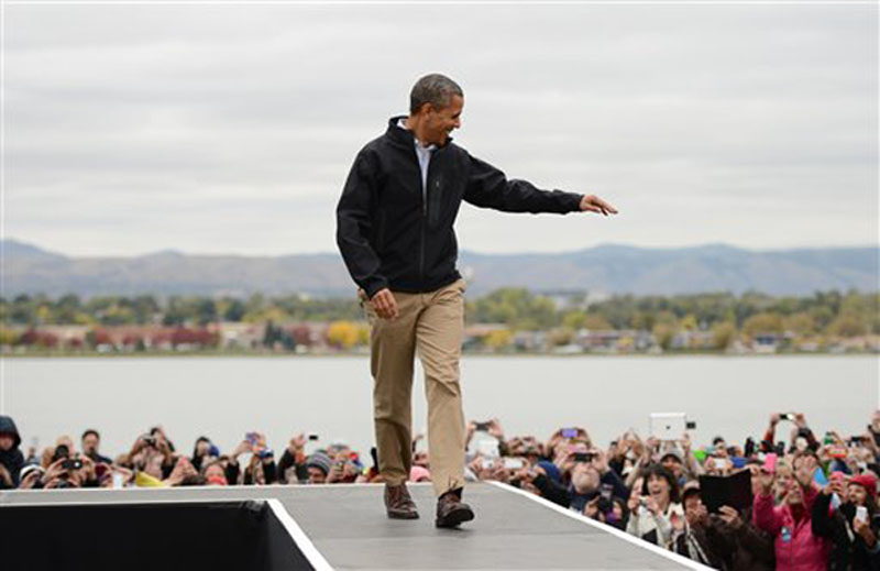 President Barack Obama greets supporters during a post-debate rally, Thursday, Oct.4, 2012, at Sloan's Lake Park in Denver. (AP Photo/The Denver Post, RJ Sangosti)