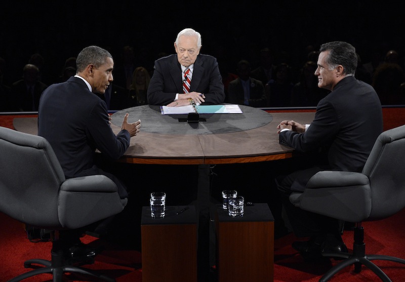 Republican presidential nominee Mitt Romney and President Obama answer a question during the third presidential debate Monday night at Lynn University in Boca Raton, Fla. Starting Tuesday, there are just 14 full days of campaigning remaining.