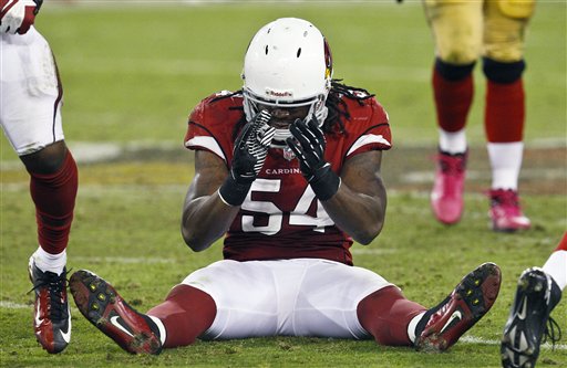 Arizona Cardinals' Quentin Groves sits on the ground after making a tackle during the second half of an NFL football game against the San Francisco 49ers Monday, Oct. 29, 2012, in Glendale, Ariz. The 49ers defeated the Cardinals 24-3. (AP Photo/Ross D. Franklin) NFLACTION12; University of Phoenix Stadium