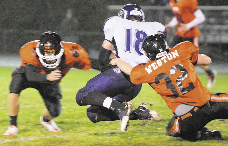 Tyler Jamison, left, Brad Weston, right, and the Gardiner football team will take on Brewer in a Pine Tree Conference Class B quarterfinal game tonight.