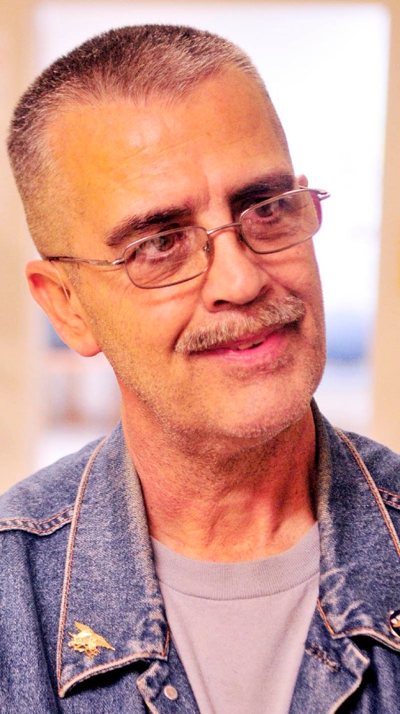 Mark Seger volunteers during the annual Maine Homeless Veterans Stand Down on Saturday at the VA Healthcare Systems Maine Medical Center - Togus.