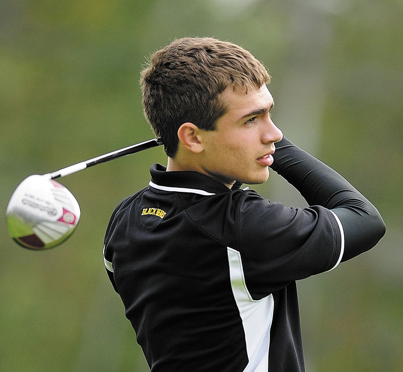 FOLLOW THROUGH: Maranacook’s Matt Delmar tees off on the first hole during the Class B golf team state championships Saturday morning at Natanis Golf Club in Vassalboro.