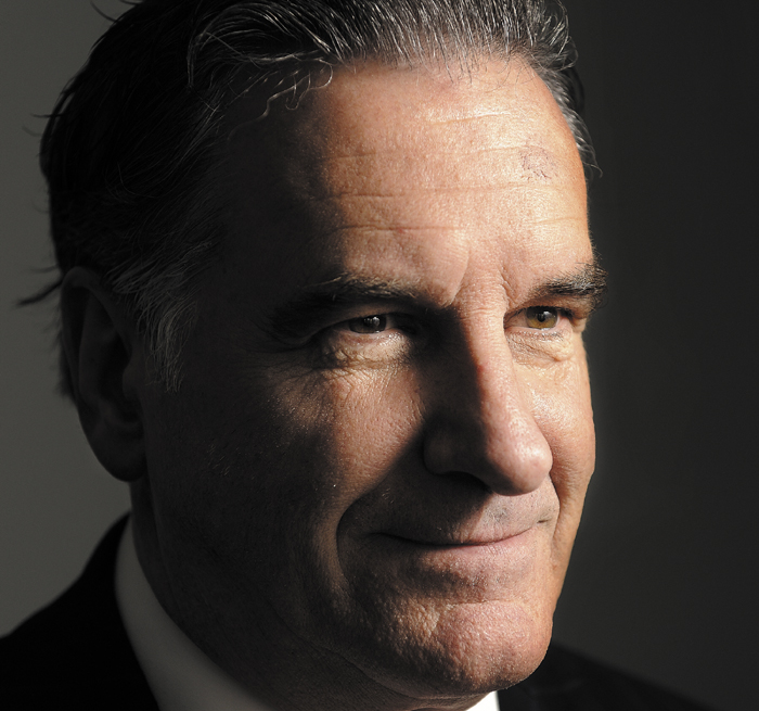 Mike Cote, 57, a drywall finisher from Ogunquit, photographed in his home Monday, October 21, 2012, is the nation's leading Mitt Romney impersonator.