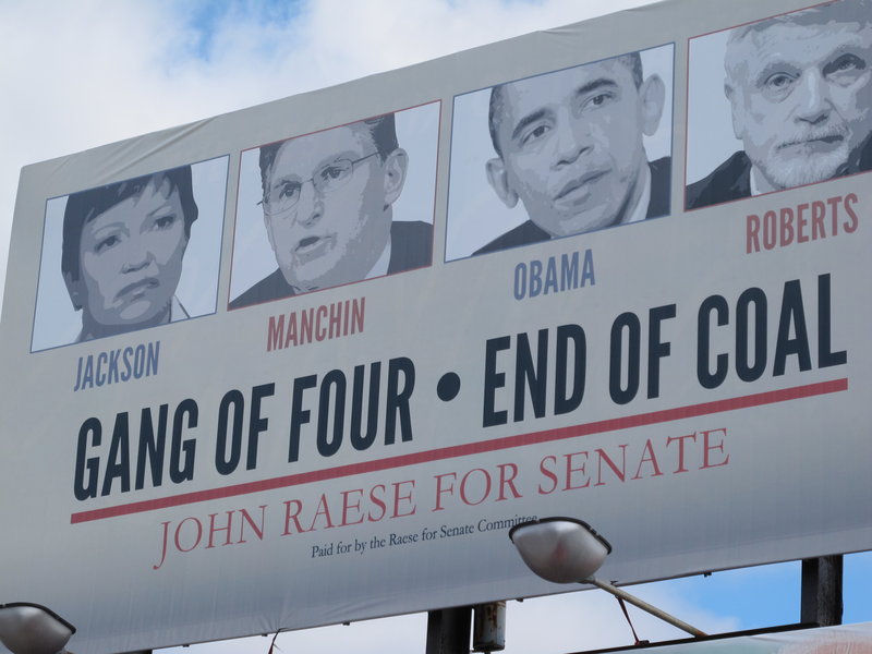 Republican candidates are spreading a message of blame for miners’ troubles in their campaigns this year, as in this sign that targets Democratic U.S. Sen. Joe Manchin in Morgantown, W.Va. In eastern Kentucky, southwestern Virginia and all of West Virginia, voters now face a common enemy: the federal government, especially the EPA.