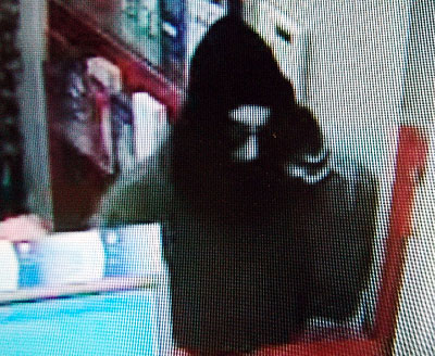 A video surveillance image shows the man police say robbed the Capitol Street CVS pharmacy in Augusta Wednesday afternoon.