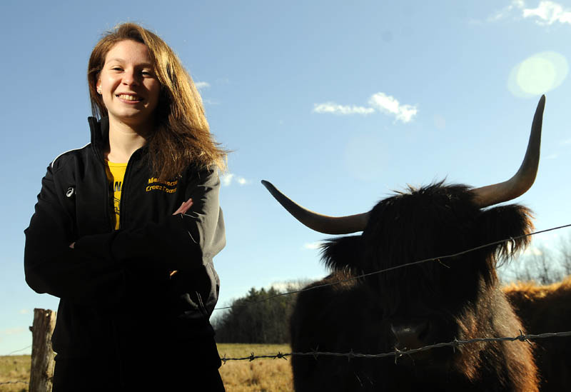 Maranacook Community High School's Caroline Colan is the Kennebec Journal Girls Cross Country Runner of the Year.