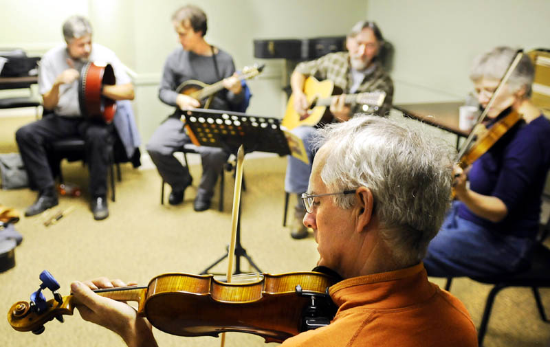 Acoustic musicians jam Sunday at the Viles Arboretum in Augusta during the inaugural get-together for either aspiring or experienced musicians. The group plans to meet monthly at the arboretum with an hour of slow jam for novice players, and a couple hours to follow of bluegrass and contra tunes.