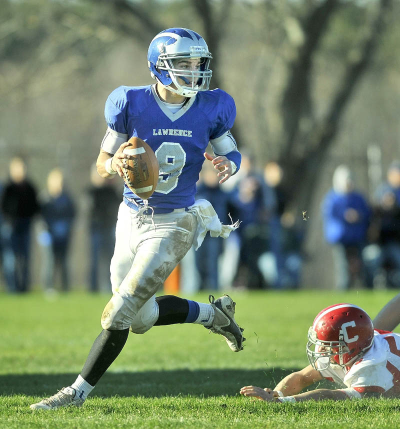 MAKING PLAYS: Lawrence High School’s Spencer Carey is a defensive playmaker from his safety position and also runs the Bulldogs’ offense as its quarterback.