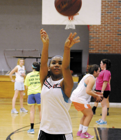 TIME TO START: Hall-Dale High School’s Dani Sweet practices foul shots Monday on the first day of practice in Farmingdale.