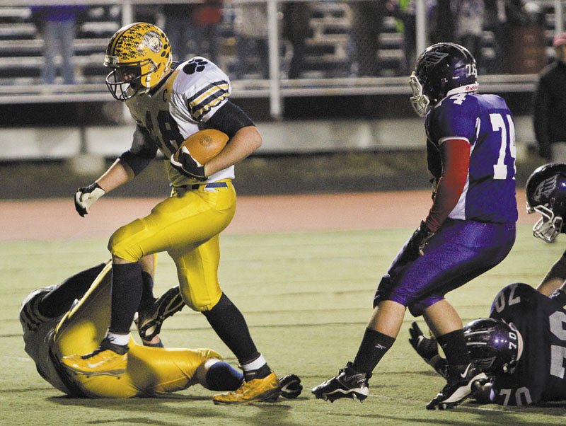 Mt. Blue running back Chad Luker scores the first touchdown against Marshwood during the first quarter of the Class B football state championship game Saturday at Fitzpatrick Stadium in Portland.