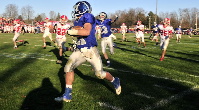 Lawrence High School's Josh Doolan runs 47 yards for a touchdown to put his team up 19-10 over Cony High School Saturday. Lawrence won 20-10.
