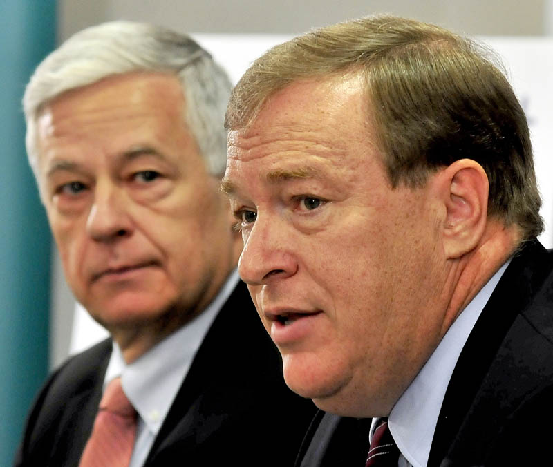 Democrat Mike Michaud, left, and Republican Kevin Raye are shown at an Oct. 16 debate.