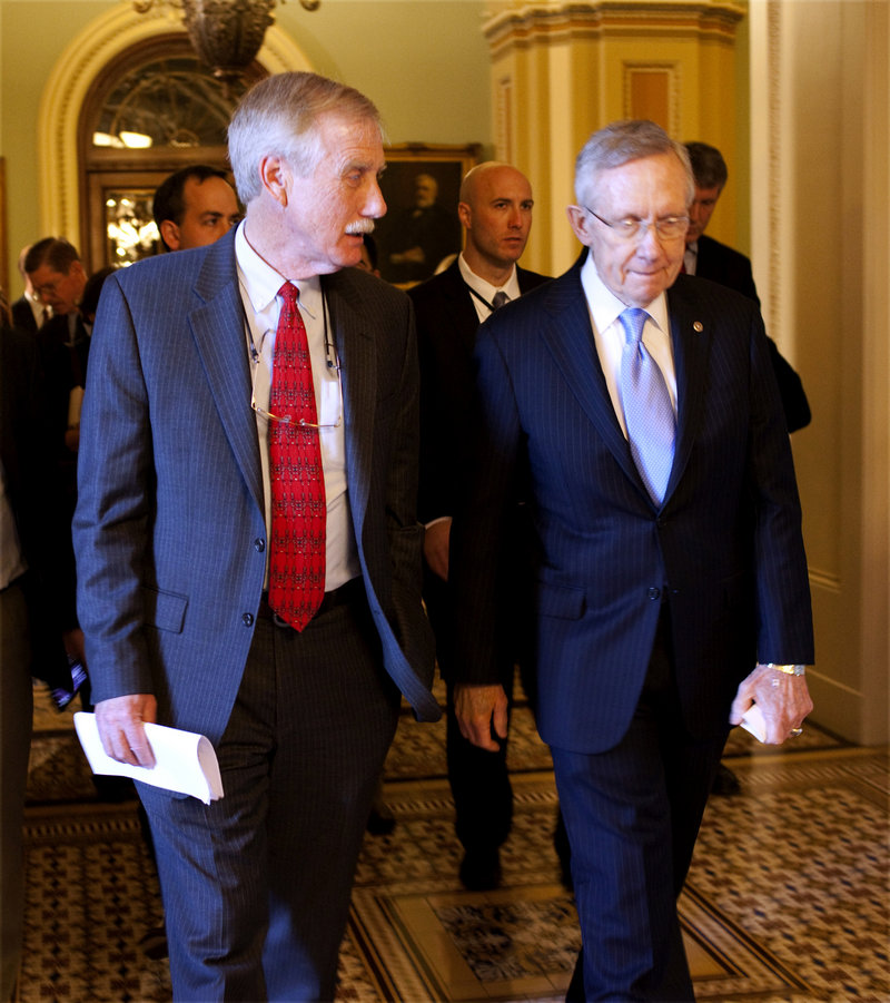 U.S. Senator-elect Angus King is pictured with Sen. Harry Reid, D-Nev., last week.