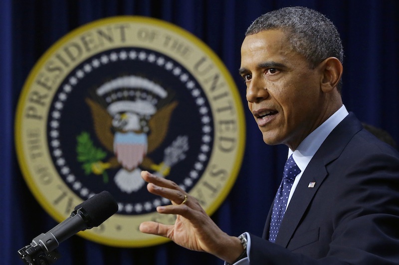 President Barack Obama gestures as he speaks about the fiscal cliff, Monday, Dec. 31, 2012, in the South Court Auditorium at the White House in Washington. The president said it appears that an agreement to avoid the fiscal cliff is "in sight," but says it's not yet complete and work continues. (AP Photo/Charles Dharapak)