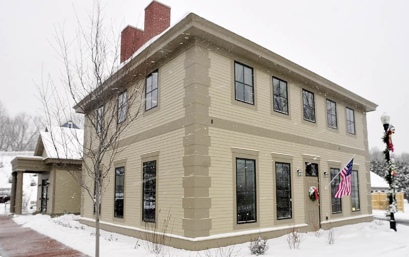 The new Kennebec Savings Bank branch, at the corner of Main and Northern Avenues in Farmingdale, as it appeared on Wednesday. The building was designed to resemble the house that was demolished earlier this year on the same lot.