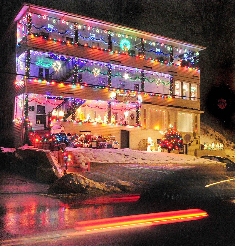 Staff photo by Joe Phelan This decorated triple-decker apartment building was photographed at 7:51 p.m. on Tuesday on Mount Vernon Avenue near Mill Street in Augusta.