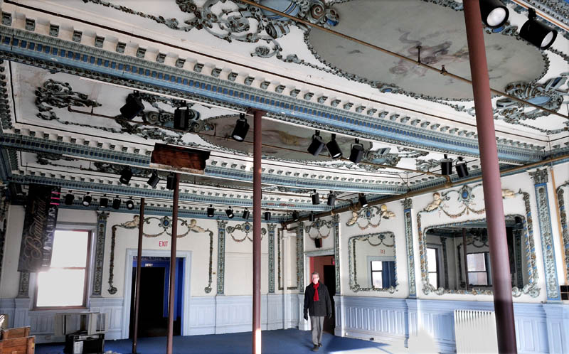 Realtor Tom Munson walks through the ornate dining room at the former Gerald Hotel in Fairfield recently. The Main Street fixture building has been sold and will be renovated into apartments for low-income seniors.