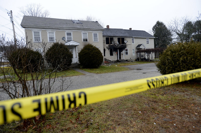 In this Monday, Dec. 10 photo, a three-unit Windham apartment building on Gray Road that was damaged by fire on Friday.