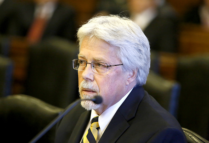 Mark Strong Sr. listens to the judge during his arraignment on Oct. 10 at the Cumberland County Courthouse in Portland. The prosecution against Strong has suffered a number of setbacks, leaving the status of his trial in doubt, with potential jurors ordered to call a court hotline Monday morning for further instructions.