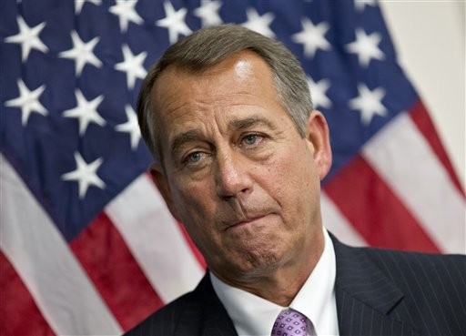 Speaker of the House John Boehner, R-Ohio, talks to reporters after a long closed-door meeting on a strategy to deal with a potential debt crisis, at the Capitol in Washington, Tuesday, Jan. 22, 2013. House Republicans have said that they will not agree to a long-term debt ceiling increase unless the Senate works with them to pass a budget deal. (AP Photo/J. Scott Applewhite)