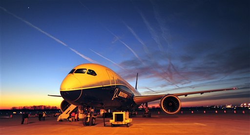 Boeing's newest aircraft, the 787, sits on the tarmac at Huntsville International Airport in Huntsville, Ala., in this Jan. 27, 2012, photo. Federal investigators are probing a fire aboard an empty 787 in Boston on Monday, the latest glitch for a high-profile jet that has a lot riding on it, both for Boeing and its airline customers.